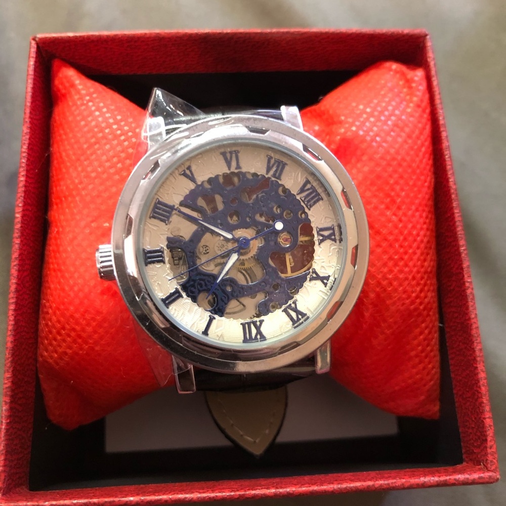 Watch blue white dial skeleton watch self winding no batteries needed